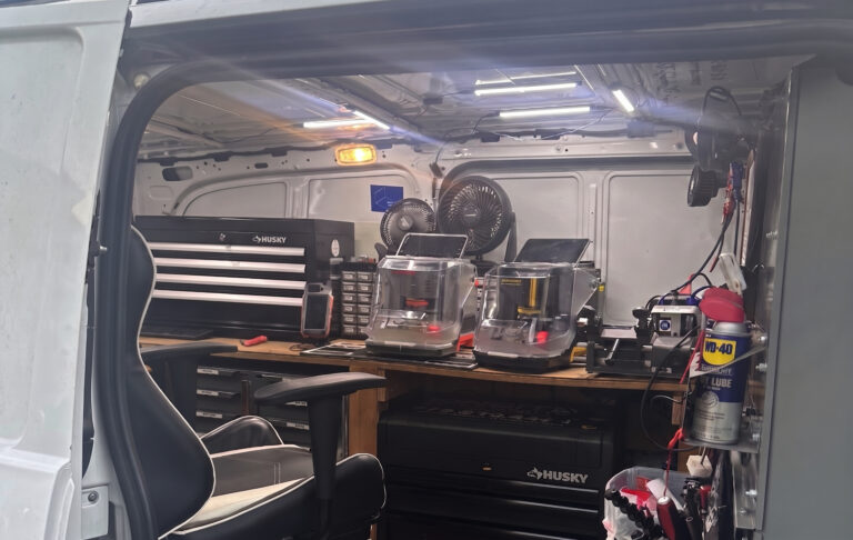Locksmith service van with a mobile key-cutting workshop